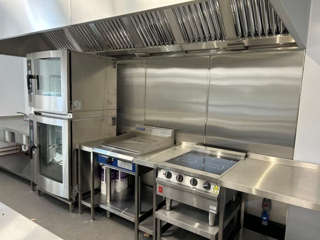 Youth Zone Grimsby Kitchen showing all of the electric commercial kitchen appliances such as the ovens and stoves.